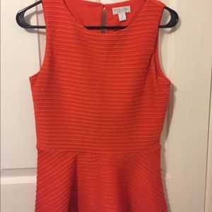 Orange peplum top
